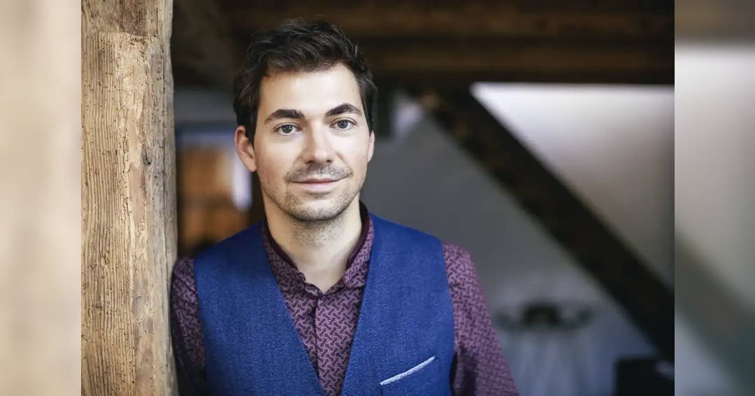 Image A stage full of hands